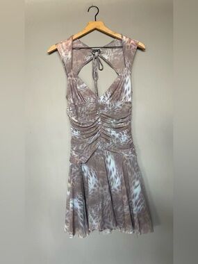 Silence + Noise ruched mini dress with a leopard print and a halter neckline.